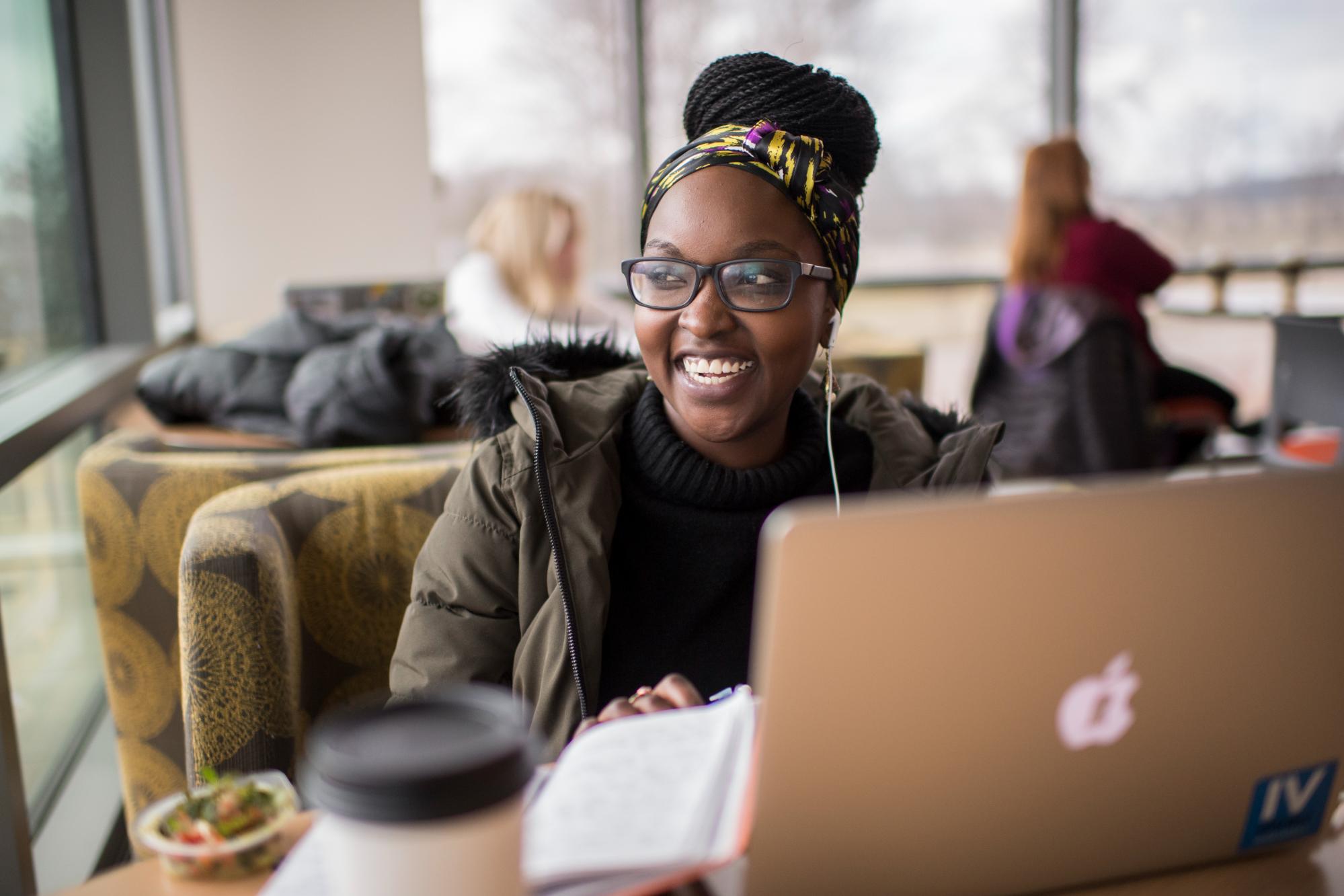 GVSU student at her computer.